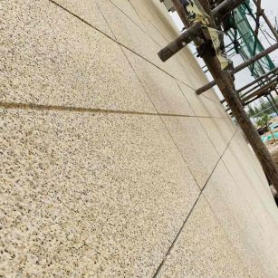 无锡 黄金麻花岗岩荔枝面外墙干挂石材效果示例