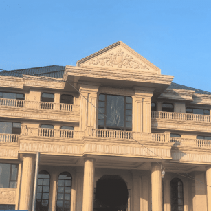 无锡黄金麻别墅外墙干挂石材效果示例