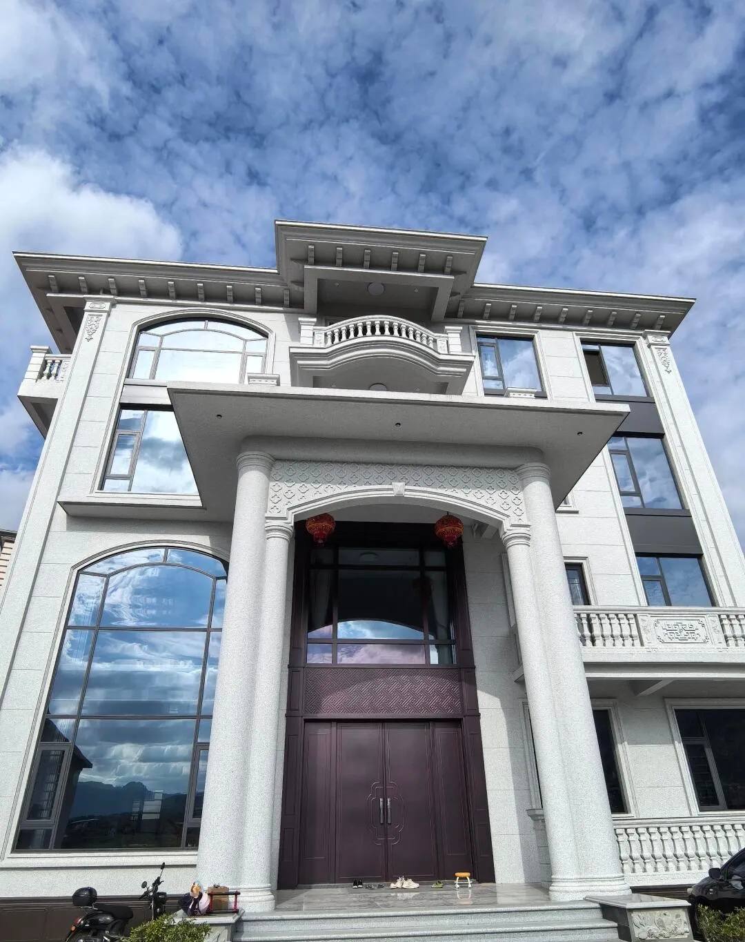 无锡白麻别墅外墙干挂石材效果示例